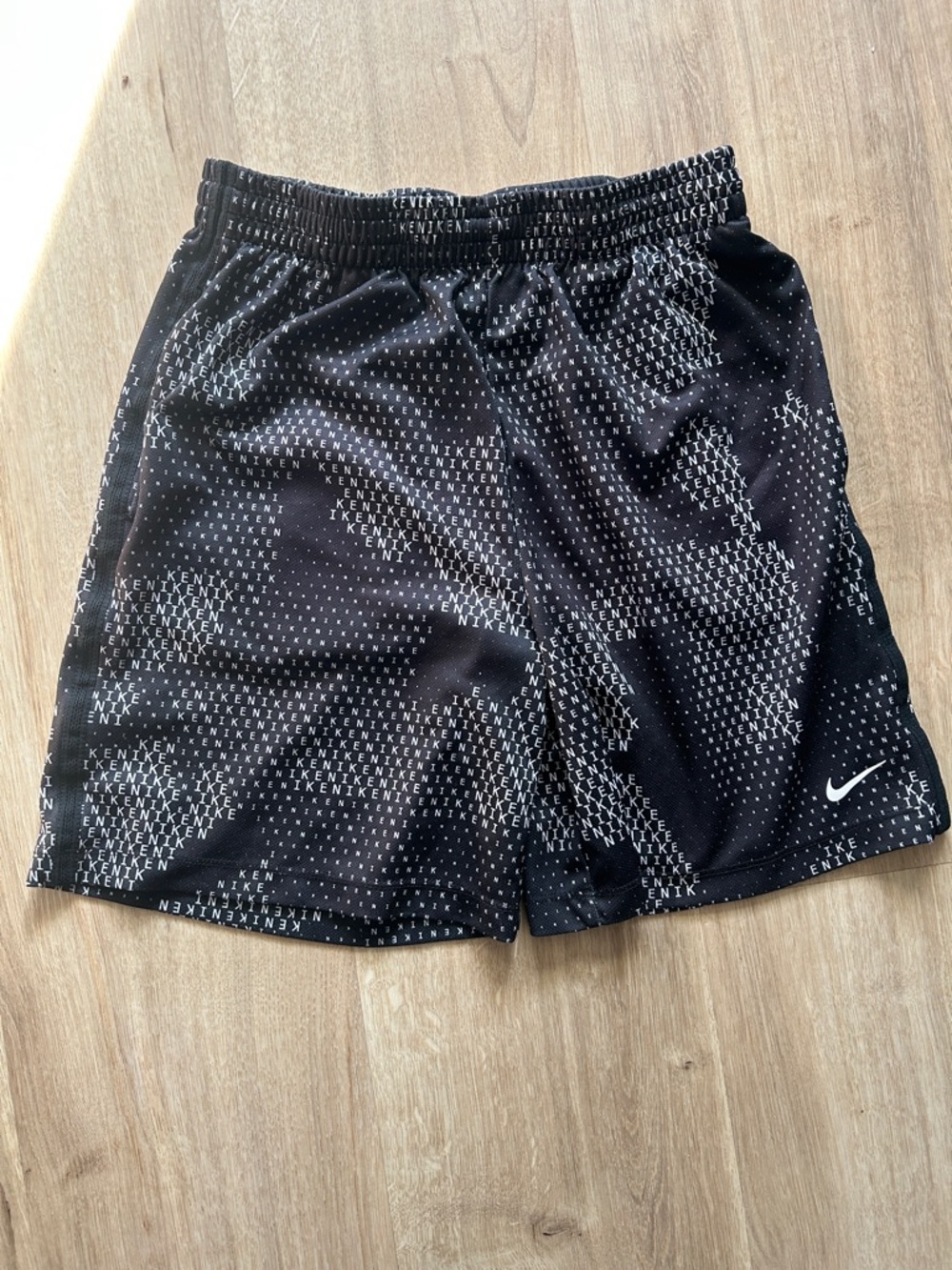 Nike Men’s Black Athletic Mesh Shorts with White Swoosh
